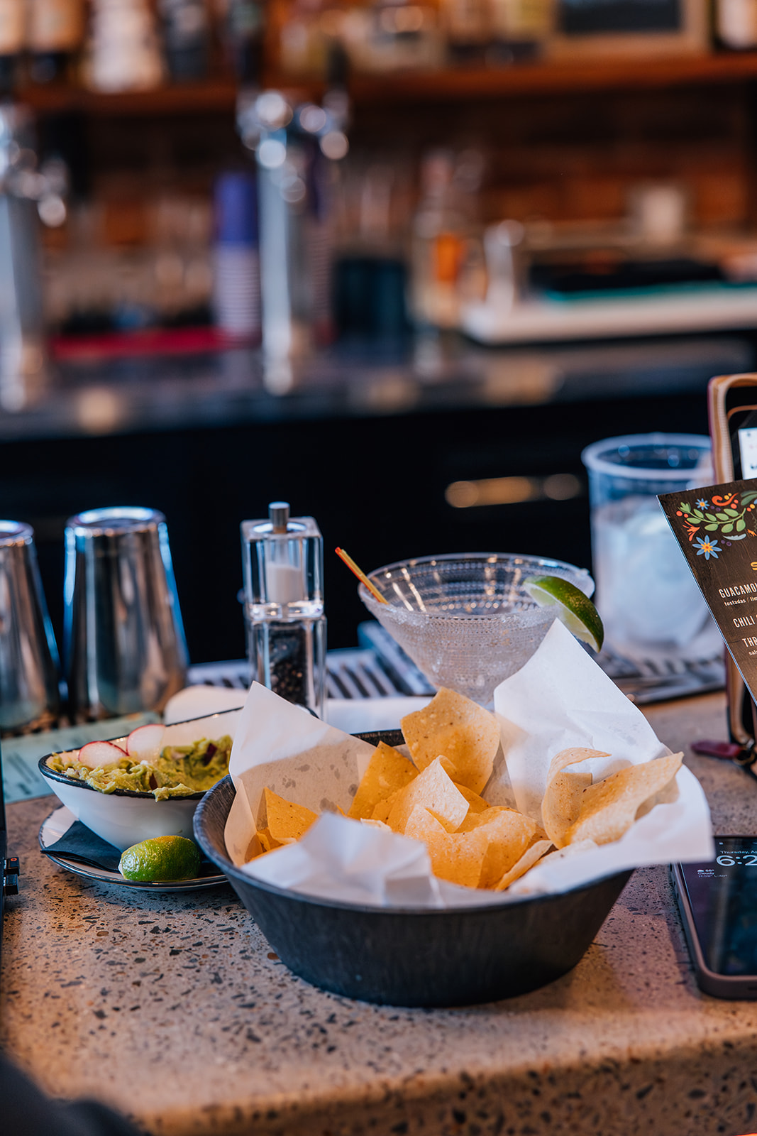 Del Chuco chips and guac on the bar