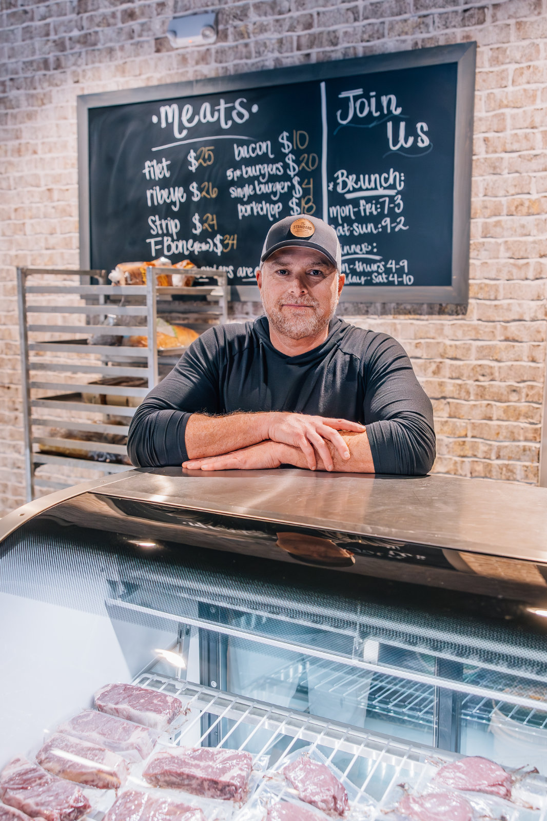 The Standard owner behind fresh meat counter